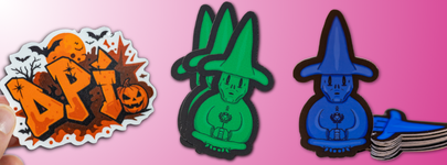 Halloween-themed DPI die cut sticker beside stacks of wizard stickers